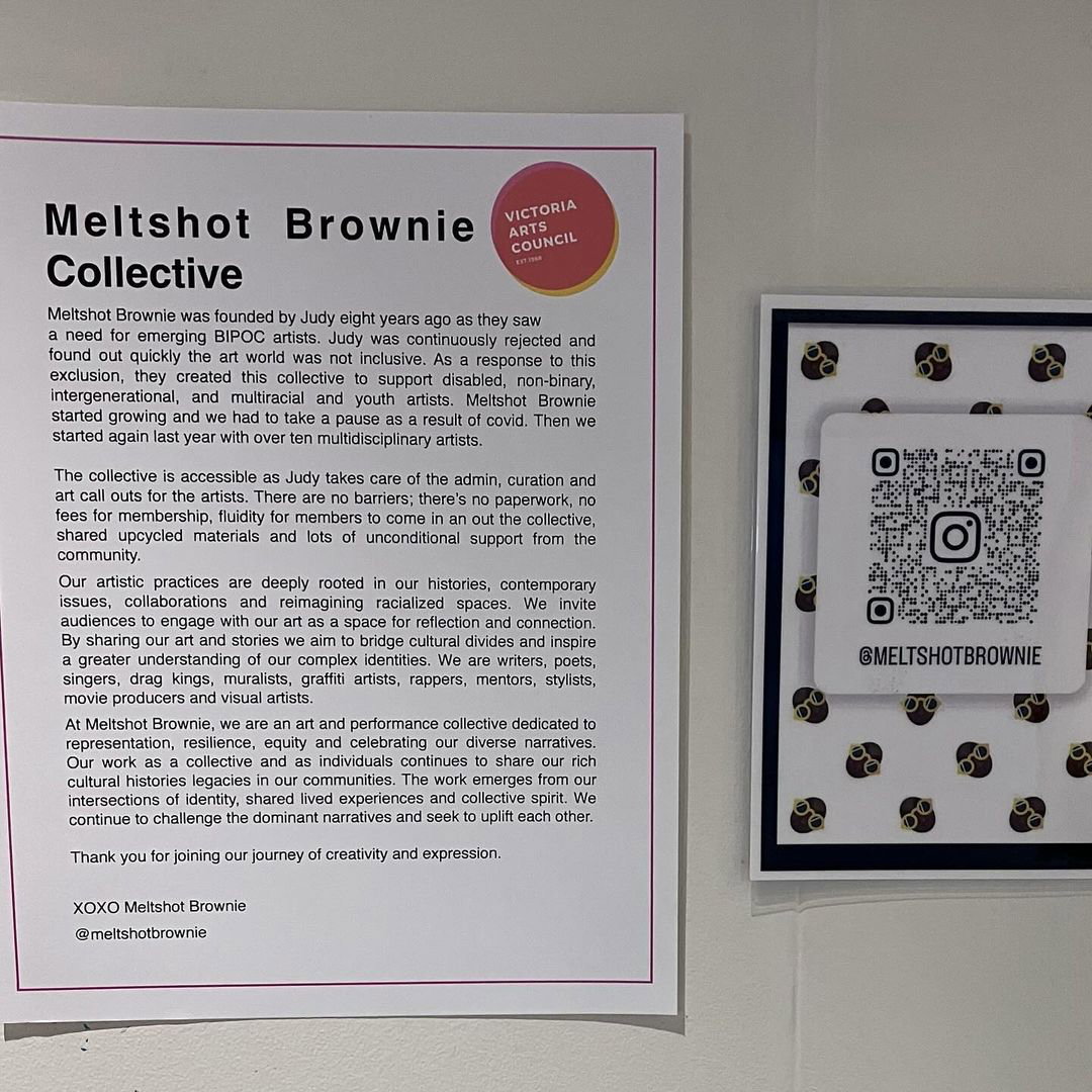 An exhibition plaque with a text bio about the Meltshot Brownie Collective.