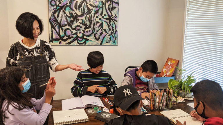 Jeni Guiding a Journalling Workshop.
