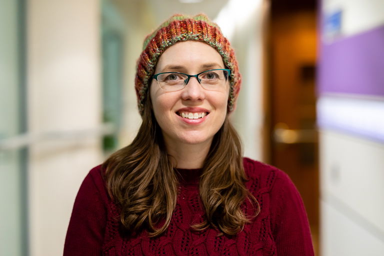 Aubrey in her hand-knitted hat. Photo courtesy of Stephen Dagg/The PMCF