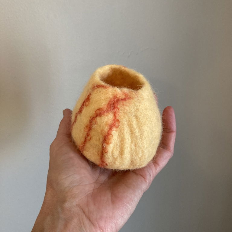 Wet felted pod demo. Photo credit: Chris Liszak