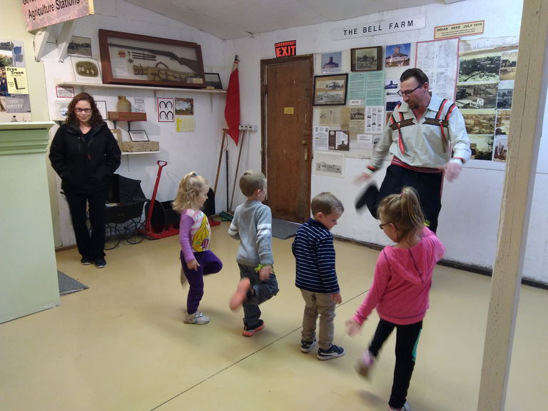 Derek Racette teaching Métis jigging. Photo courtesy of Linda Kort, Indian Head Museum Society.