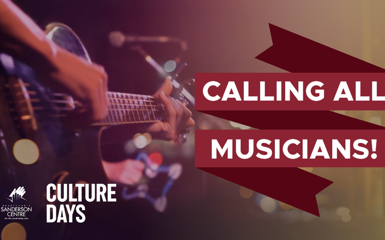 Musician strums guitar