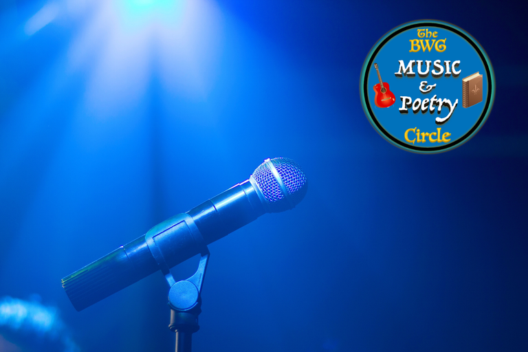 An open microphone in blue light