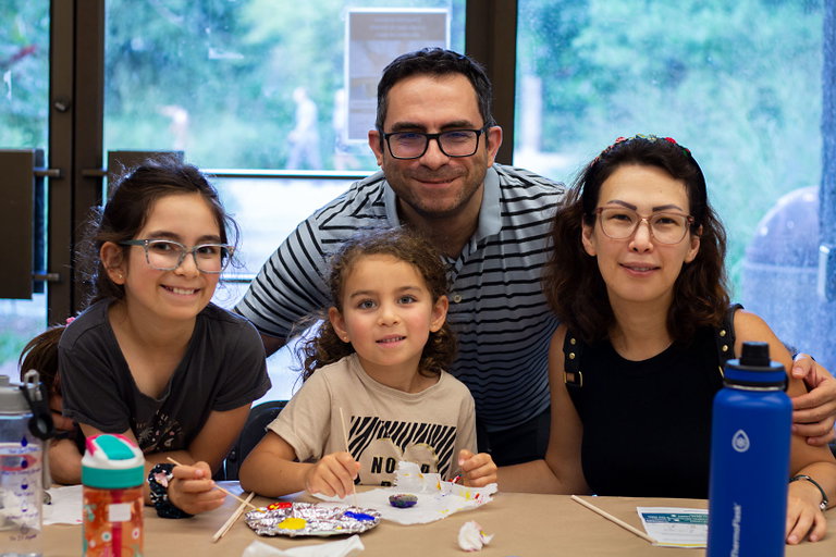 A family enjoying the art making workshops at the McMichael