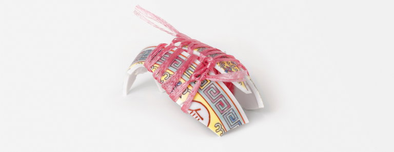 Phuong Nguyen, Turtle Shell, found ceramic rice bowl, plastic twine, resin, 2021. Photo: Greg McCarthy.