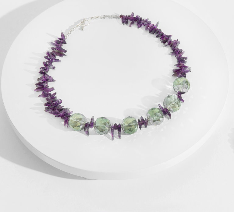 Necklace using purple and green stones