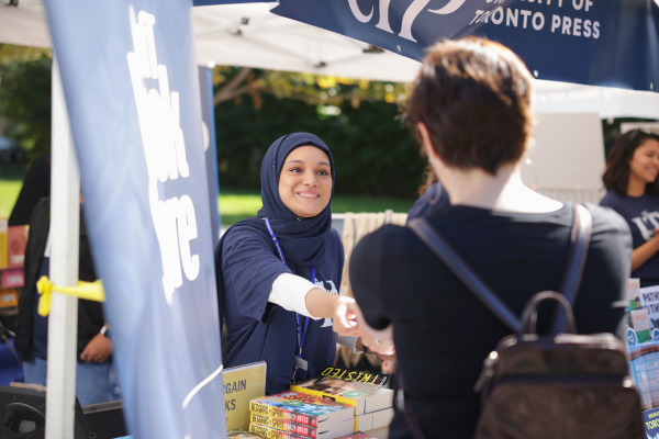 An exhibitor shares a purchase with a customer