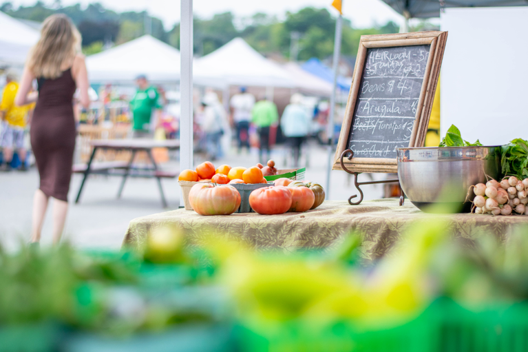 Close up of a vendor table at a farmers' market