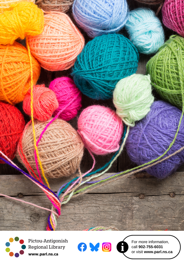 a rainbow of balls of yarn arranged in a balloon