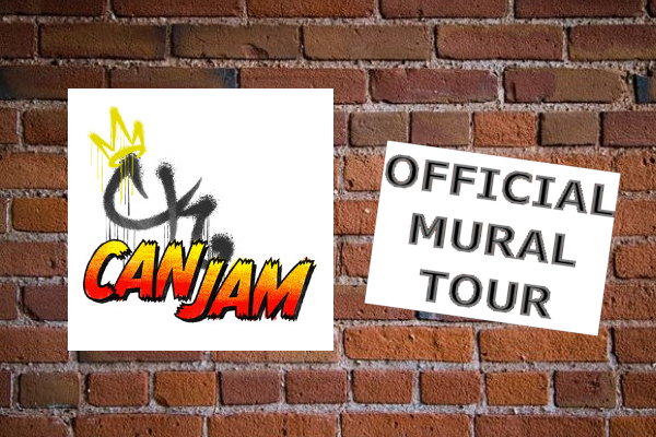 Brick wall in background with graphics pretending to be posters. One is the CK CanJam logo, the other says “OFFICIAL MURAL TOUR” in all caps.