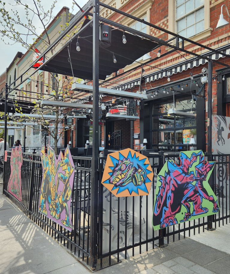artwork panels on a patio downtown