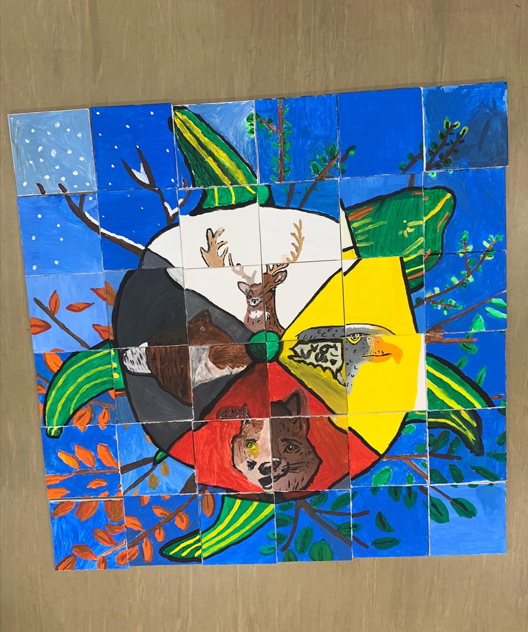Medicine Wheel mural completed with Grade 6 students as part of Weyburn Culture Days 2022
