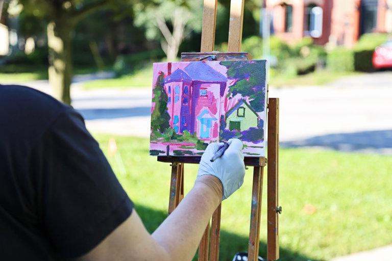 artist painting abstract house